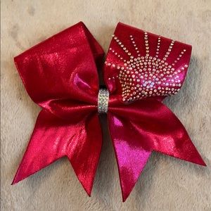 A cheerleading bow🎀